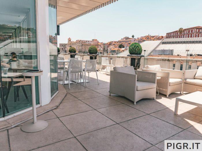 white armchairs in front of store